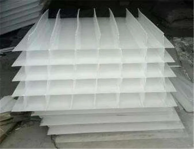 Stacked inclined settler media packs used inside a clarifier tank