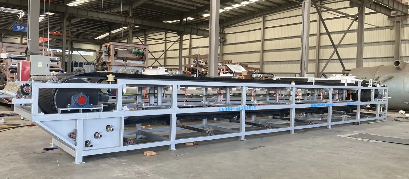 Production hall of our factory with a treatment line under assembly